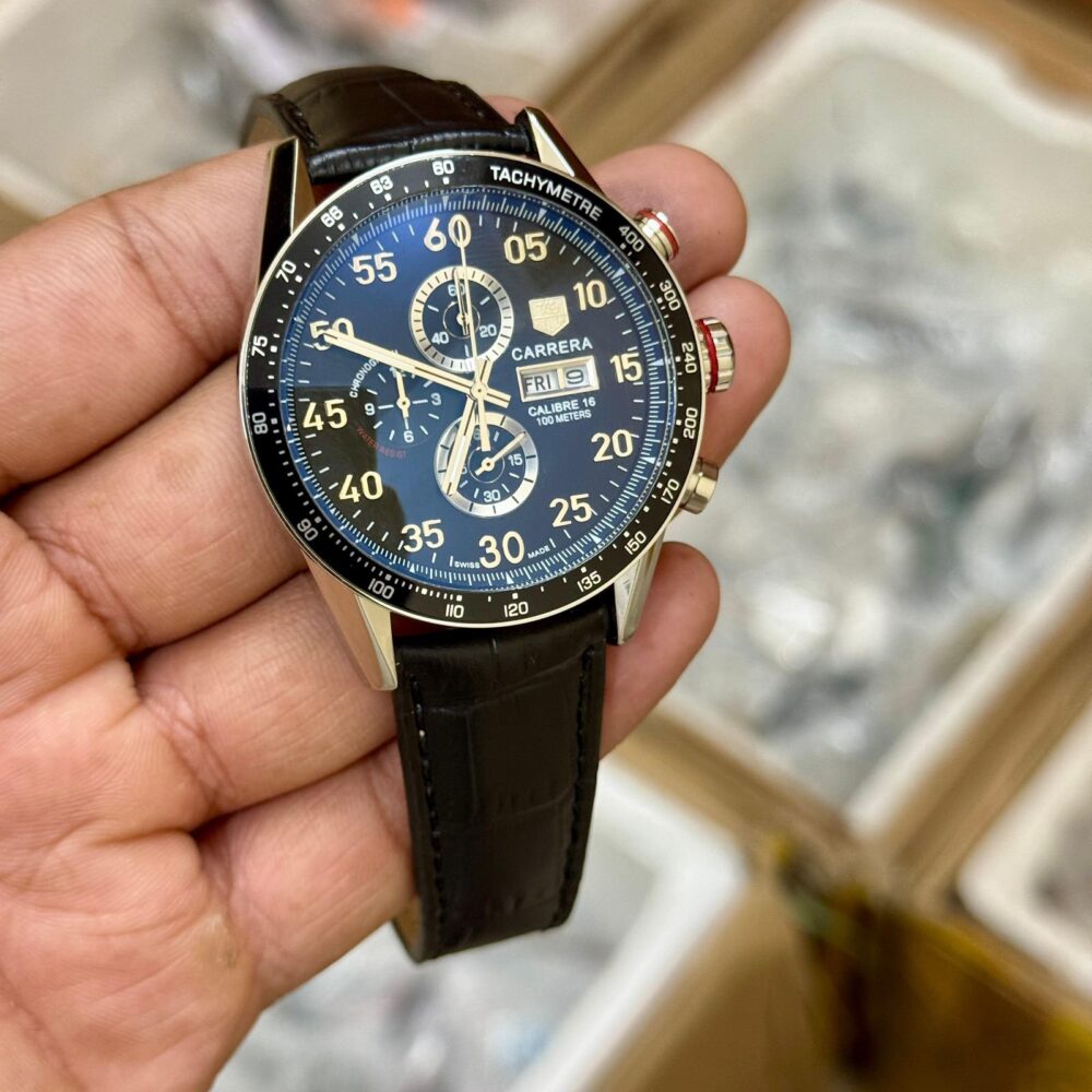 ⭐️ *The sleek, heritage-style design of the TAG Heuer Carrera Calibre 16 Day-Date hearkens back to the collection’s earliest racing roots. The uncluttered, all-black dial is legible in even the most challenging conditions.* ⭐️ - Image 3